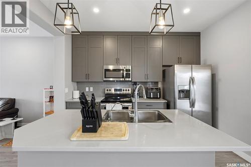 608 Brighton Gate, Saskatoon, SK - Indoor Photo Showing Kitchen With Stainless Steel Kitchen With Upgraded Kitchen