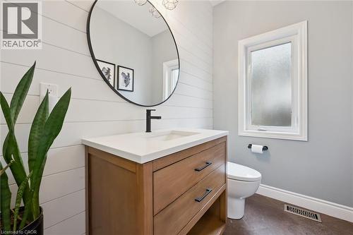 Bathroom with vanity and wooden walls - 469 Woodbine Avenue, Kitchener, ON - Indoor Photo Showing Bathroom