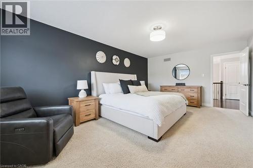Bedroom featuring light colored carpet and baseboards - 469 Woodbine Avenue, Kitchener, ON - Indoor Photo Showing Bedroom