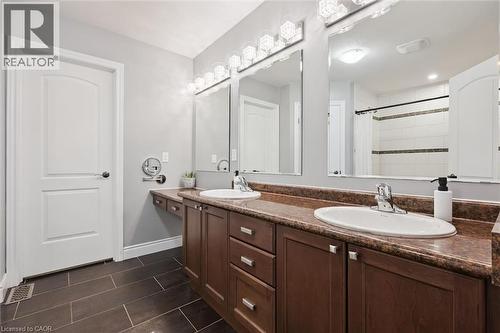 Full bathroom featuring double vanity and tiled shower - 469 Woodbine Avenue, Kitchener, ON - Indoor Photo Showing Bathroom