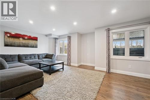 Living room featuring light wood-style floors and recessed lighting - 469 Woodbine Avenue, Kitchener, ON - Indoor Photo Showing Living Room