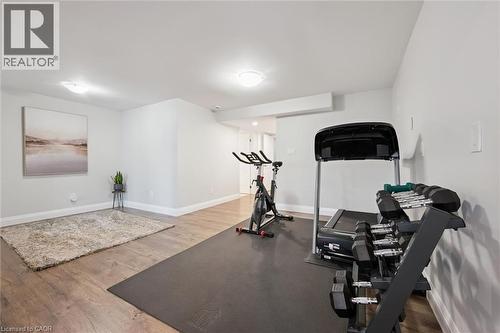 Exercise area with light wood-type flooring - 469 Woodbine Avenue, Kitchener, ON - Indoor Photo Showing Gym Room