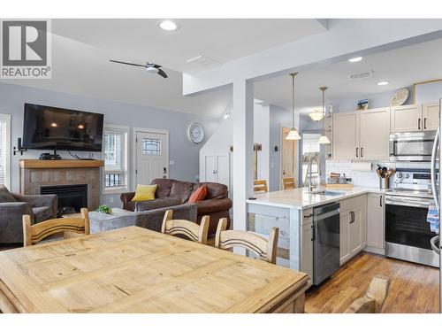 6844 Santiago Loop, Kelowna, BC - Indoor With Fireplace