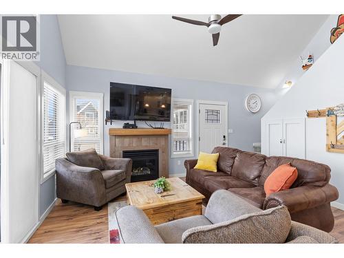 6844 Santiago Loop, Kelowna, BC - Indoor Photo Showing Living Room With Fireplace