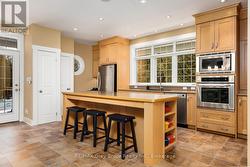 A spacious kitchen and open concept welcome you. - 