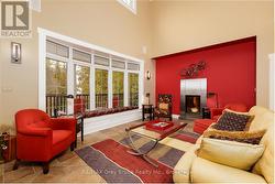 Comfortable living room with large bay window - 