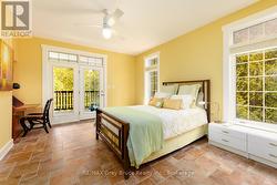 Primary bedroom feat.  walkout to the covered deck - 
