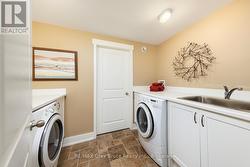 Convenient laundry room with plenty of storage - 