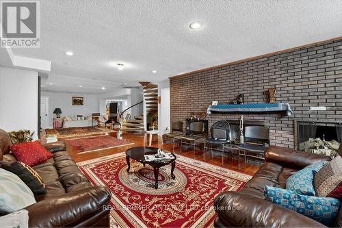 2145 Oneida Crescent, Mississauga, ON - Indoor Photo Showing Living Room With Fireplace