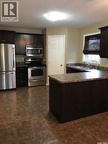 1610 5Th Avenue N, Regina, SK - Indoor Photo Showing Kitchen With Stainless Steel Kitchen