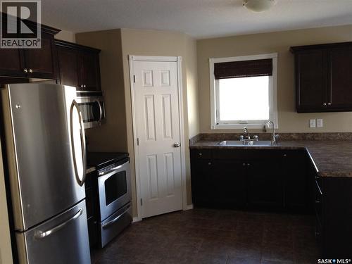 1610 5Th Avenue N, Regina, SK - Indoor Photo Showing Kitchen With Stainless Steel Kitchen With Double Sink