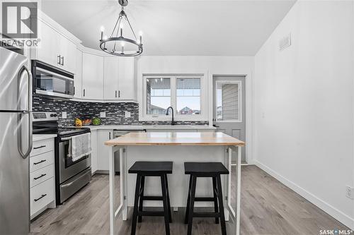 4159 Green Apple Drive E, Regina, SK - Indoor Photo Showing Kitchen With Stainless Steel Kitchen With Upgraded Kitchen