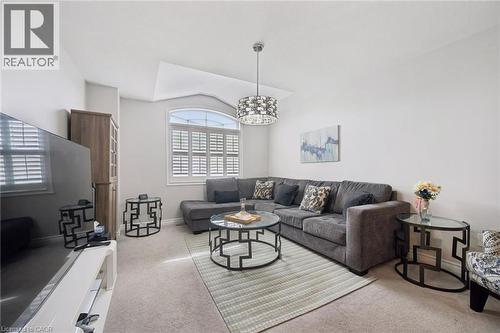 Living area with light carpet and baseboards - 38 Park Glen Street, Kitchener, ON - Indoor Photo Showing Living Room