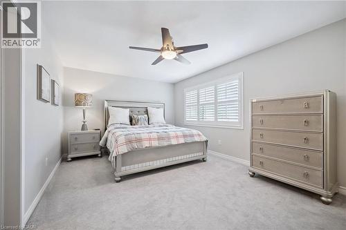 Bedroom with a ceiling fan and light carpet - 38 Park Glen Street, Kitchener, ON - Indoor Photo Showing Bedroom