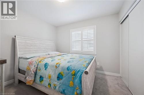 Bedroom featuring carpet floors and a closet - 38 Park Glen Street, Kitchener, ON - Indoor Photo Showing Bedroom