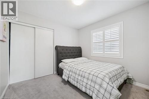 Carpeted bedroom with a closet and baseboards - 38 Park Glen Street, Kitchener, ON - Indoor Photo Showing Bedroom