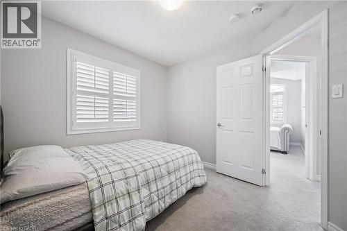 Bedroom with light colored carpet and baseboards - 38 Park Glen Street, Kitchener, ON - Indoor Photo Showing Bedroom
