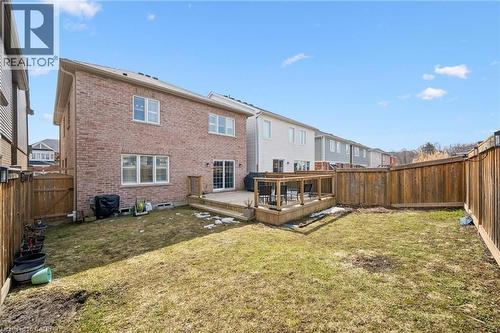 Back of property with brick siding, a deck, a gate, and a fenced backyard - 38 Park Glen Street, Kitchener, ON - Outdoor With Deck Patio Veranda With Exterior