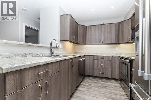 4307 108 Willis Crescent, Saskatoon, SK - Indoor Photo Showing Kitchen With Upgraded Kitchen