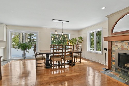 Dining Room - 43 Rue De Charny, Lorraine, QC - Indoor With Fireplace