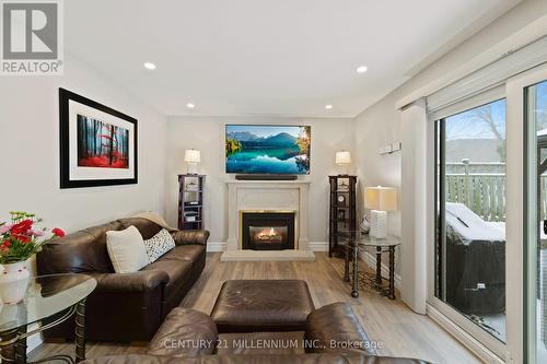 4 Marchmount Crescent, Brampton, ON - Indoor Photo Showing Living Room With Fireplace