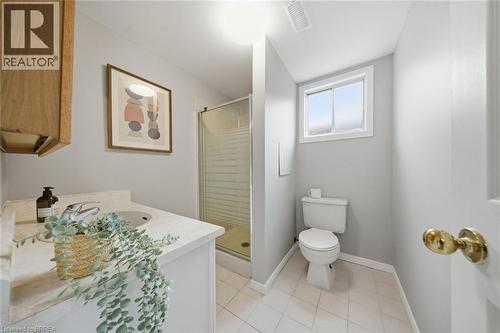 Bathroom with vanity, a stall shower, and light tile patterned flooring - 7 Forest Drive, Paris, ON - Indoor Photo Showing Bathroom