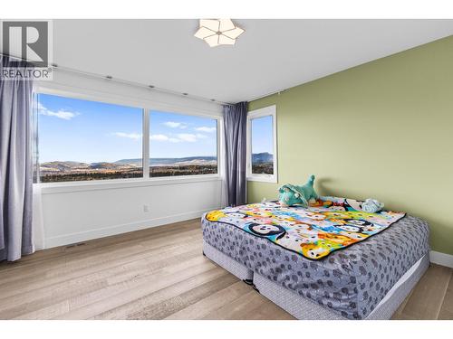 2nd floor bedroom - 1068 Clarance Avenue, Kelowna, BC - Indoor Photo Showing Bedroom