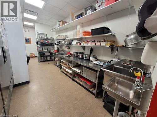 Kitchen featuring a paneled ceiling and a sink - 2000 Appleby Line, Burlington, ON 