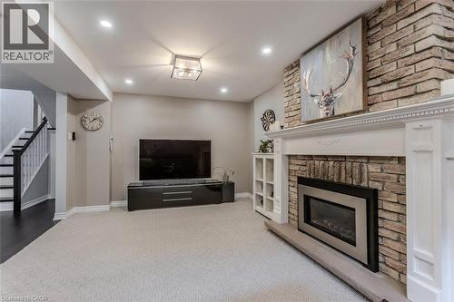 2360 Cavendish Drive, Burlington, ON - Indoor Photo Showing Living Room With Fireplace