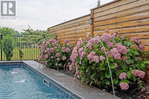 2091 Pennyroyal Street, London North (North D), ON - Outdoor With In Ground Pool