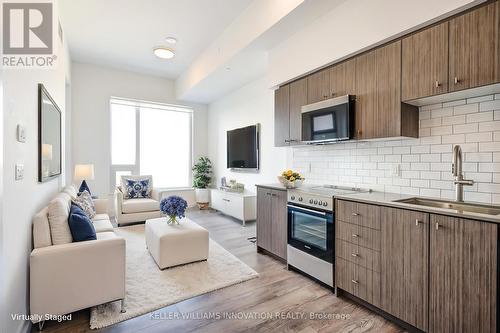 303 - 15 WELLINGTON STREET S  Kitchener, ON N2G 0E4