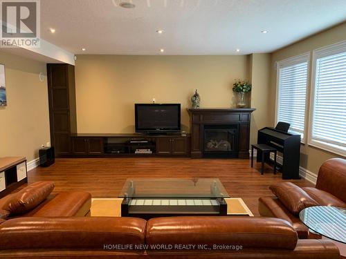 Entertaining Area in the w/o Basement - 106 Paige Street, Kitchener, ON - Indoor Photo Showing Other Room With Fireplace