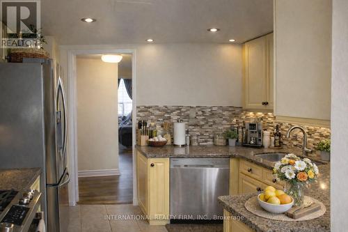 2201 - 3650 Kaneff Crescent, Mississauga, ON - Indoor Photo Showing Kitchen With Stainless Steel Kitchen