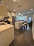 113 105 Willis Crescent, Saskatoon, SK  - Indoor Photo Showing Kitchen With Double Sink 
