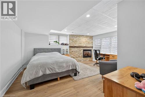 397 Caithness Street E, Caledonia, ON - Indoor Photo Showing Bedroom With Fireplace