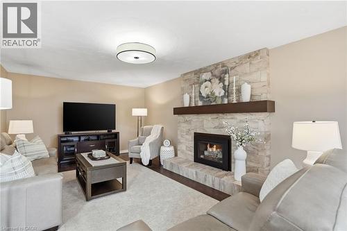 31 Republic Avenue, Hamilton, ON - Indoor Photo Showing Living Room With Fireplace