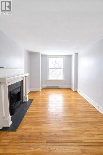 Bedroom #1 - 514 Bay Street, Ottawa, ON - Indoor Photo Showing Living Room With Fireplace