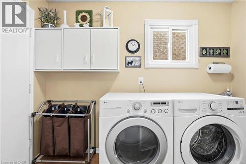 Laundry area featuring separate washer and dryer - 18 Webster Way, Georgetown, ON - Indoor Photo Showing Laundry Room