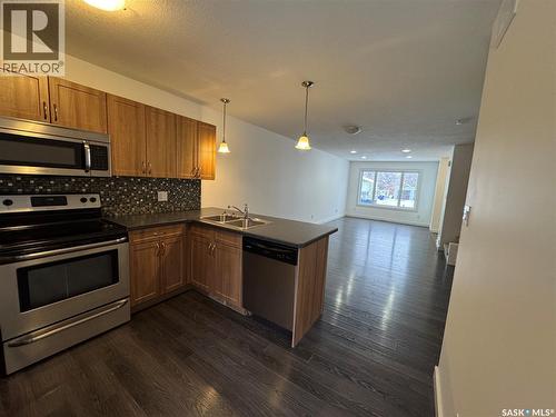 527 Alexandra Street, Weyburn, SK - Indoor Photo Showing Kitchen With Double Sink