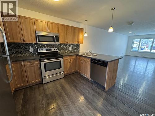527 Alexandra Street, Weyburn, SK - Indoor Photo Showing Kitchen With Double Sink