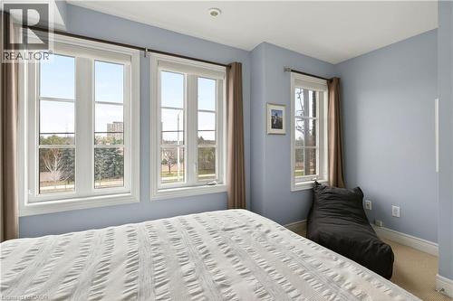 Bedroom featuring baseboards and carpet floors - 1862 Burnhamthorpe Road, Mississauga, ON - Indoor Photo Showing Bedroom