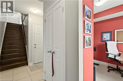 Stairway featuring baseboards and tile patterned flooring - 1862 Burnhamthorpe Road, Mississauga, ON - Indoor Photo Showing Other Room