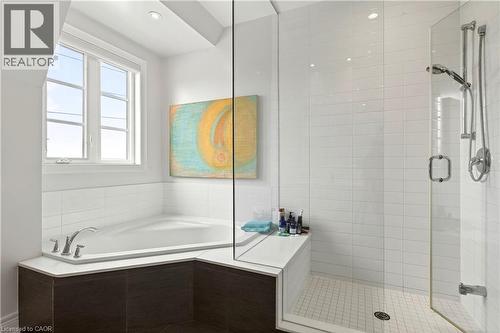 Full bathroom with a stall shower, a bath, and recessed lighting - 1862 Burnhamthorpe Road, Mississauga, ON - Indoor Photo Showing Bathroom