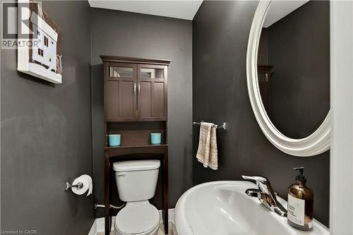 Bathroom featuring toilet and a sink - 1862 Burnhamthorpe Road, Mississauga, ON - Indoor Photo Showing Bathroom