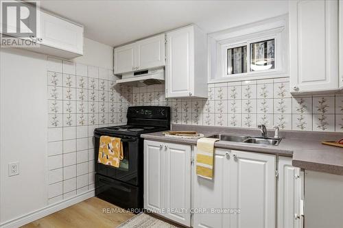 106 Beland Avenue N, Hamilton, ON - Indoor Photo Showing Kitchen With Double Sink