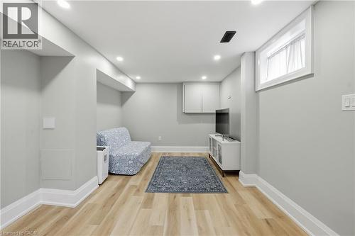 Unfurnished room featuring light wood finished floors and recessed lighting - 129 Jackson Street W, Hamilton, ON - Indoor Photo Showing Other Room