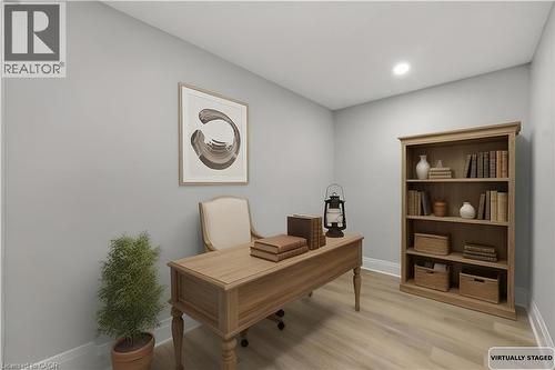 Office area featuring light wood-type flooring and recessed lighting - 129 Jackson Street W, Hamilton, ON - Indoor Photo Showing Office