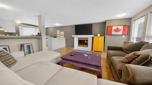 6516 Tie Lake Road, Jaffray, BC - Indoor Photo Showing Living Room With Fireplace