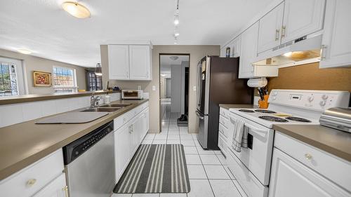 6516 Tie Lake Road, Jaffray, BC - Indoor Photo Showing Kitchen With Double Sink