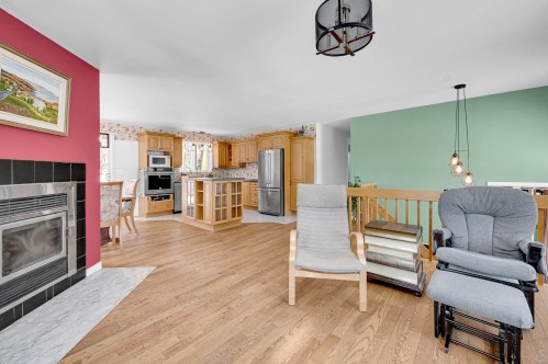 Salon - 908 Rue Raymond-Pilon, Saint-Jérôme, QC - Indoor Photo Showing Living Room With Fireplace